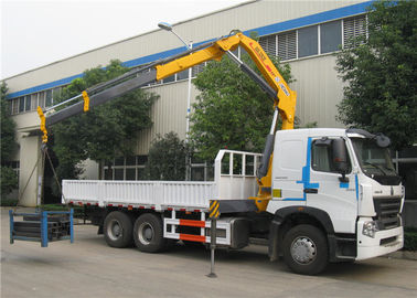 China El camión de Sinotruk HOWO A7 6x4 montó la grúa 25 toneladas de grúa recta montada cargo del brazo proveedor